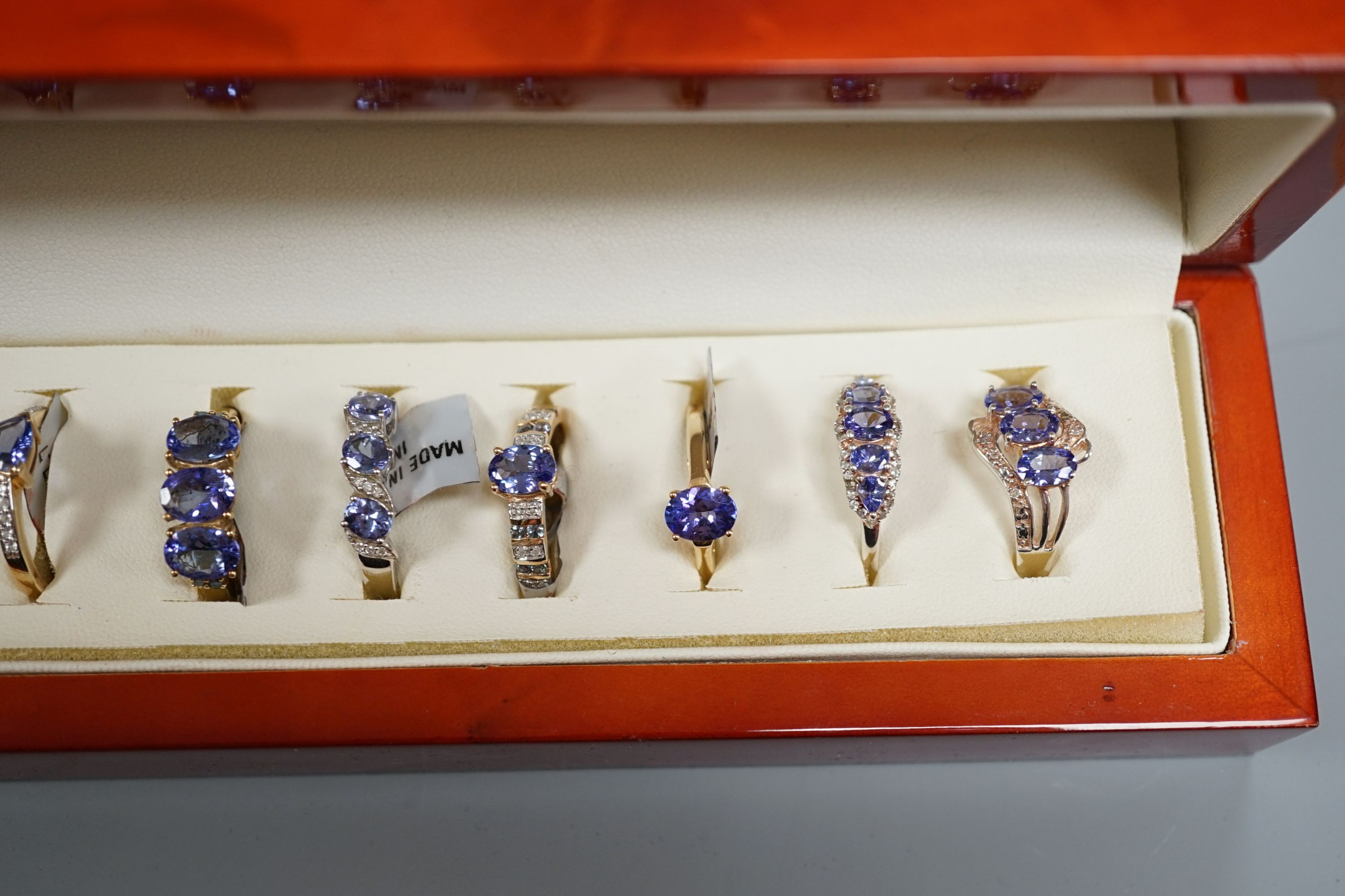 Nine assorted modern 9ct gold and tanzanite dress rings, one similar 14ct gold ring and two 925 and gem set rings